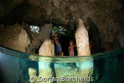 Kids watching us cave dive.Nikon D70s with 10.5 Fisheye l... by Dorian Borcherds 